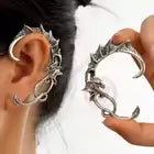 Curled dragon ear jewellery